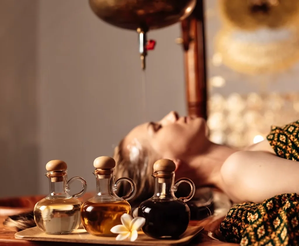 Shirodhara — warm oil flowing on the forehead during Panchakarma